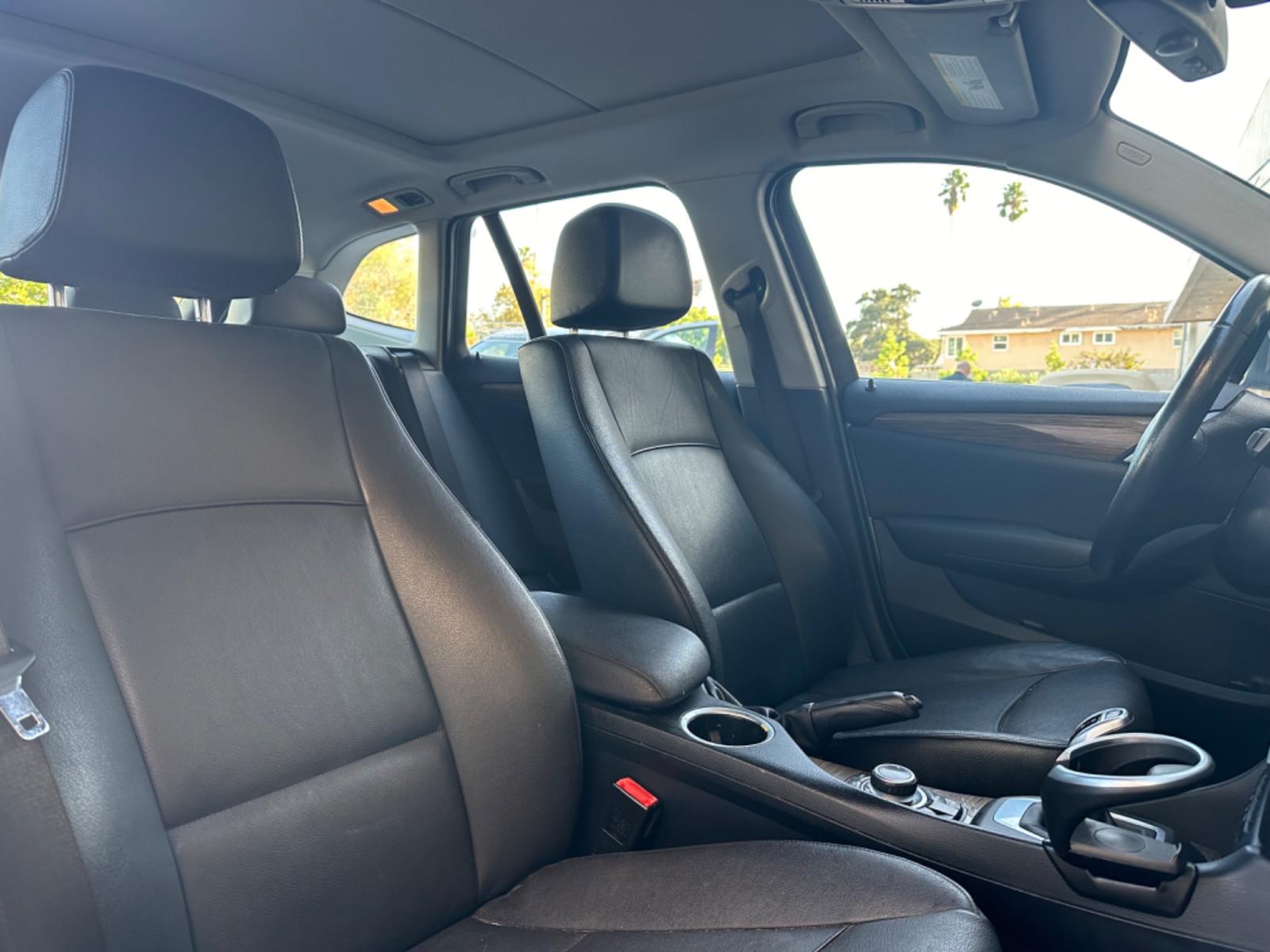 2014 WHITE /Black BMW X1 Leather (WBAVL1C56EV) with an 4 Cylinders engine, AUTOMATIC transmission, located at 30 S. Berkeley Avenue, Pasadena, CA, 91107, (626) 248-7567, 34.145447, -118.109398 - Don't let bad credit or financial setbacks hold you back from owning a luxury SUV like the 2014 BMW X1 xDrive28i. At our BHPH dealership, we're here to make the car-buying process as smooth and stress-free as possible. We invite you to visit our dealership in Pasadena, CA, to explore our inventory o - Photo #21